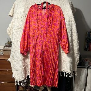 Pink and orange pleated midi dress